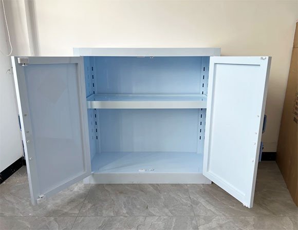 Compact PP acid storage cabinet with double doors open and adjustable perforated shelves for laboratory chemical storage